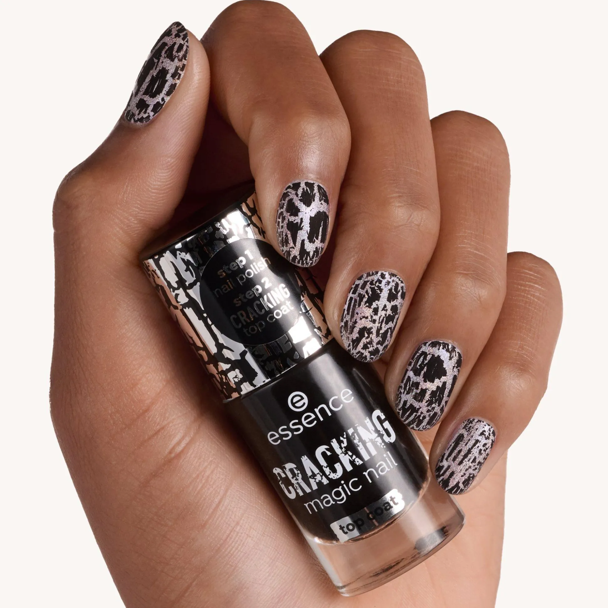 essence Über- Und Unterlack>CRACKING magic nail top coat