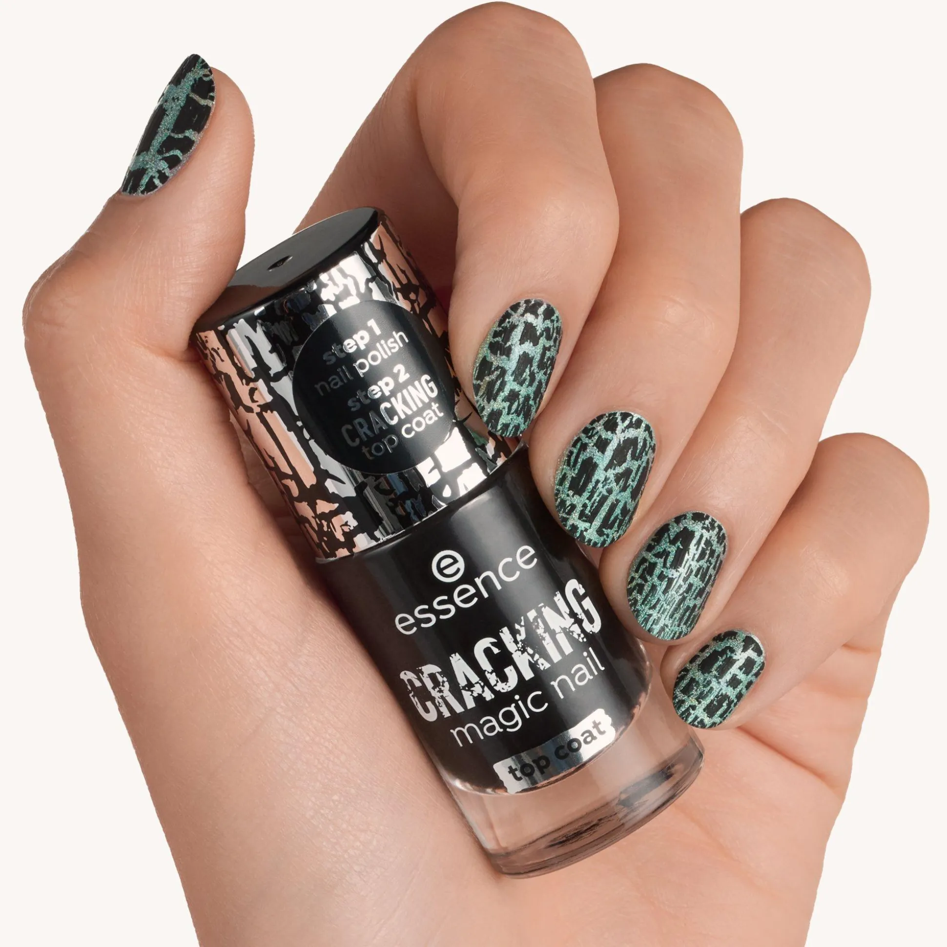 essence Über- Und Unterlack>CRACKING magic nail top coat